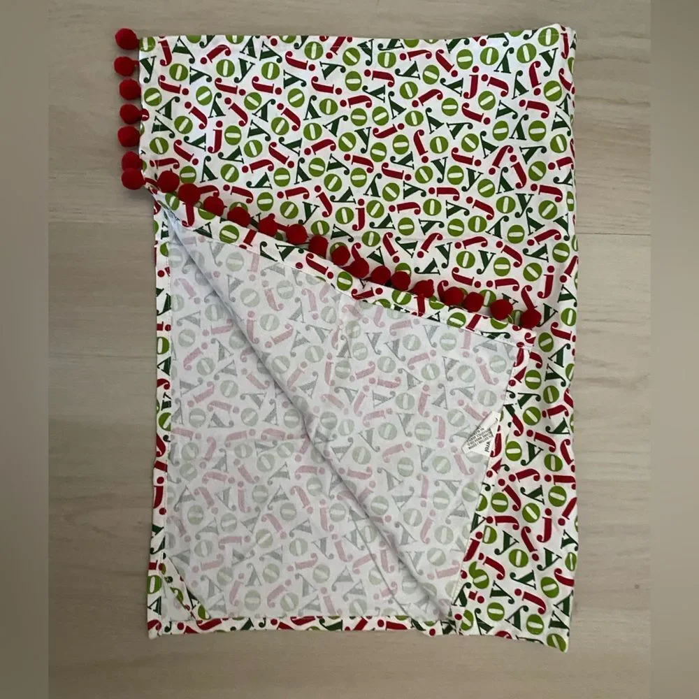 Crate & Barrel Joy Dishtowel with Red and Green Accents with Pom Poms